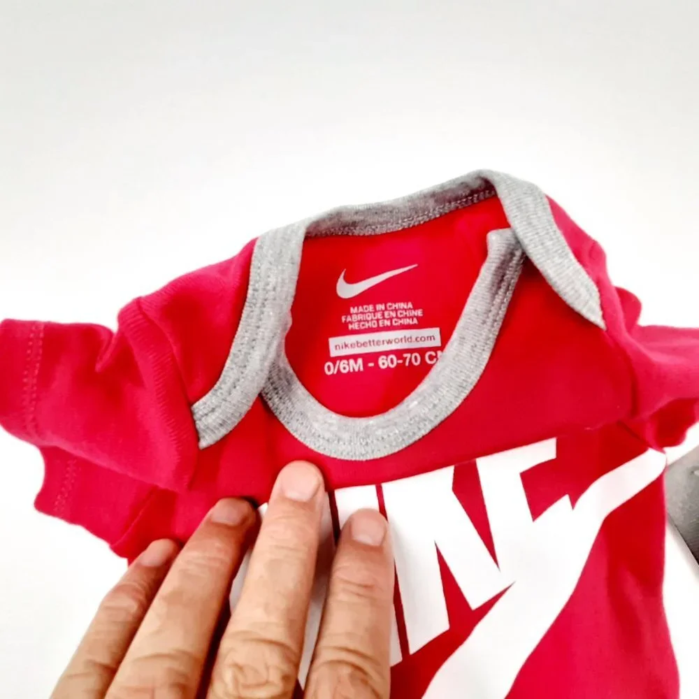 Nike Infant One Piece Baby Suit Size 0/6 Months Pink